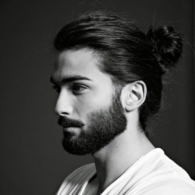 man bun hairstyle with beard